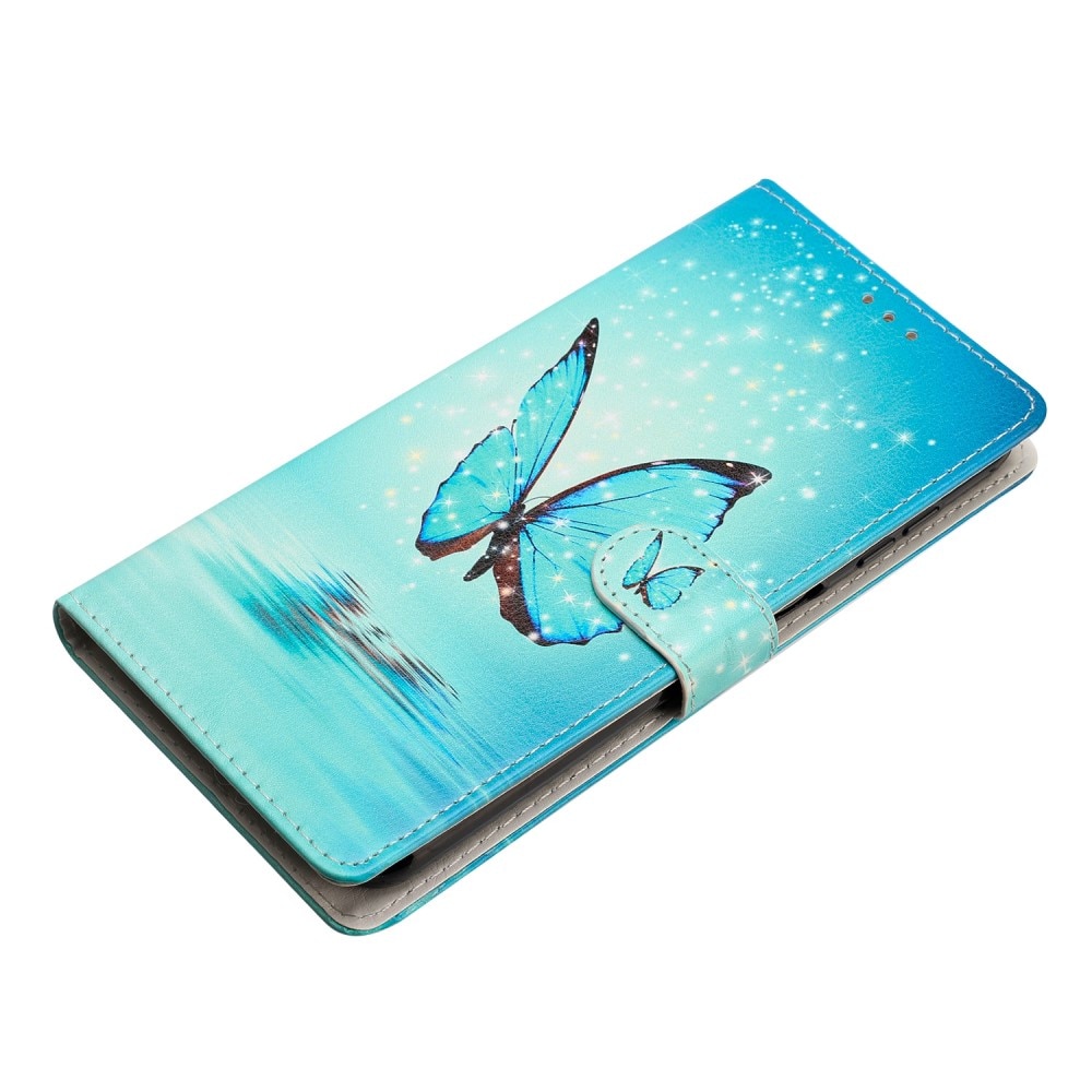 Coque portefeuille Google Pixel 9 Pro, papillons bleus